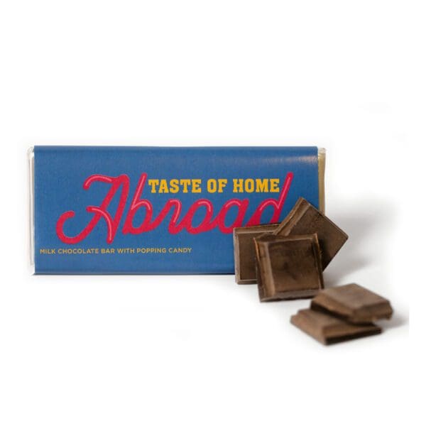 A box of chocolate with the words " abroad " on it.