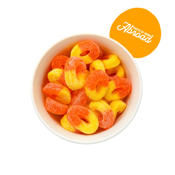 Bowl of peach-flavored gummy rings.