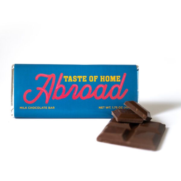 A box of chocolate with the words " abroad " on it.