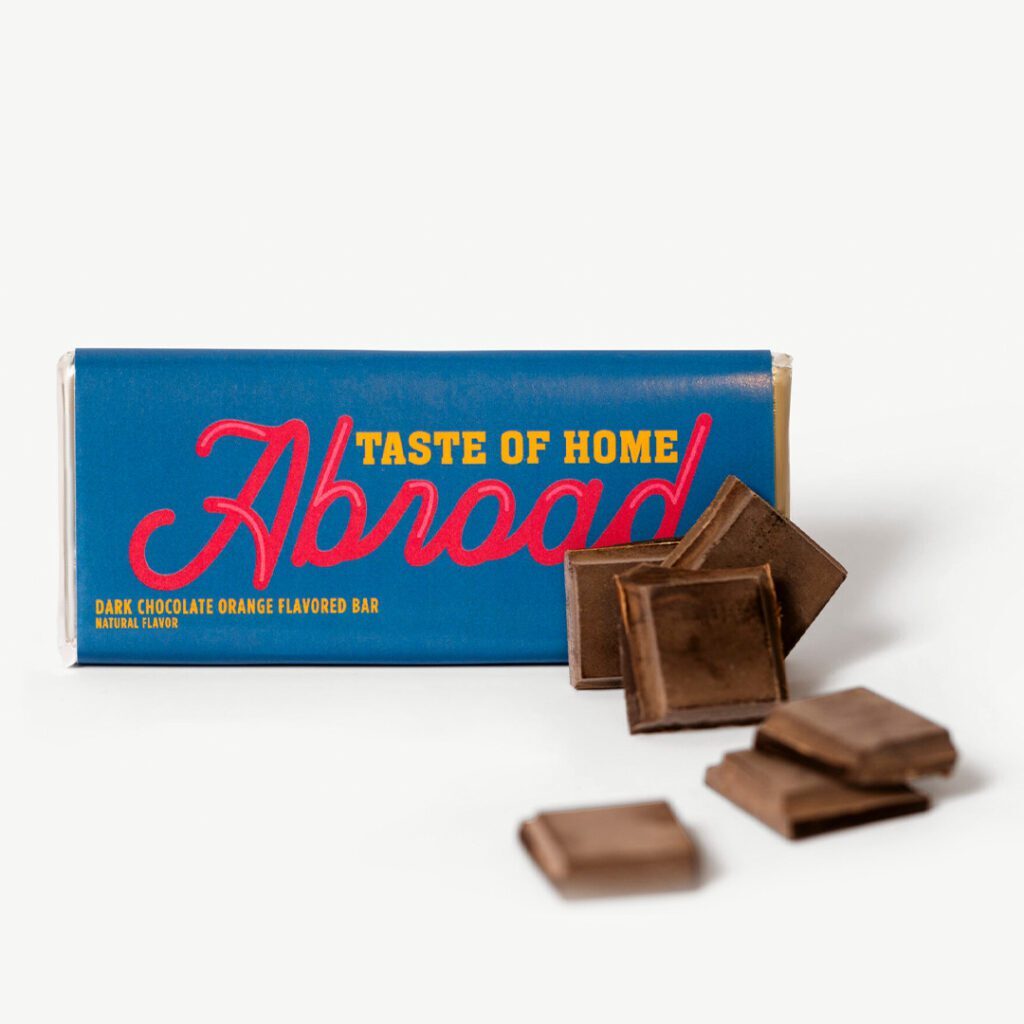 A box of chocolate with the words " abroad " on it.