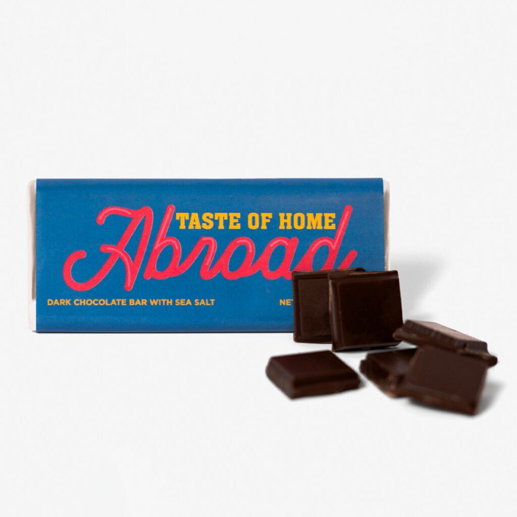 A box of chocolate with the words " abroad " on it.