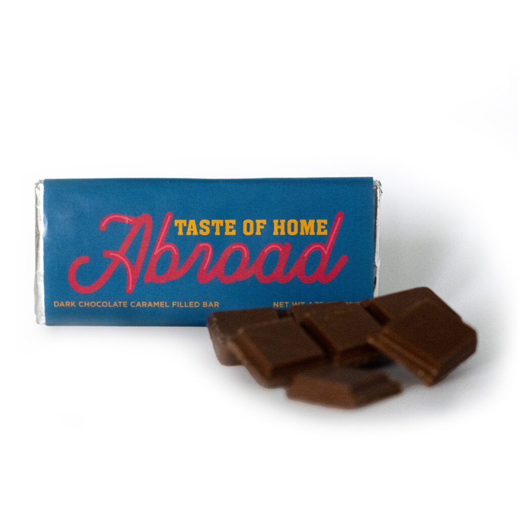 A box of chocolate covered marshmallows with the word " abroad " on it.